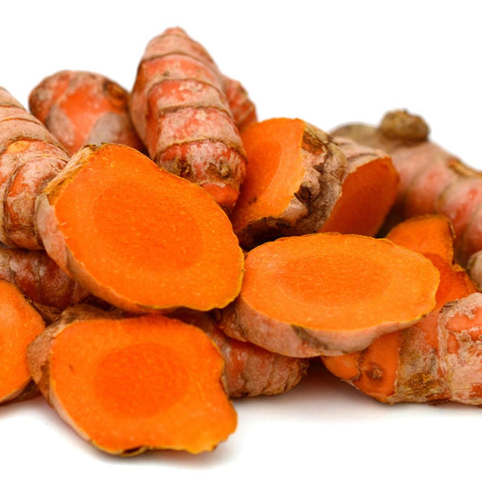 Close up of cut turmeric roots