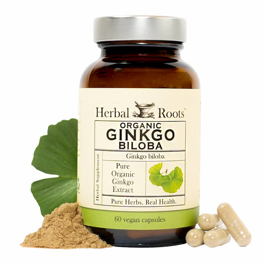 A bottle of Herbal Roots Ginkgo Biloba with a leaf, powder and capsules next to it