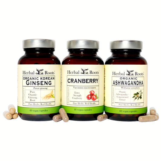 Bottle of Herbal Roots Cranberry, Korean Ginseng, and Organic Ashwagandha, with capsules in front of the bottles.
